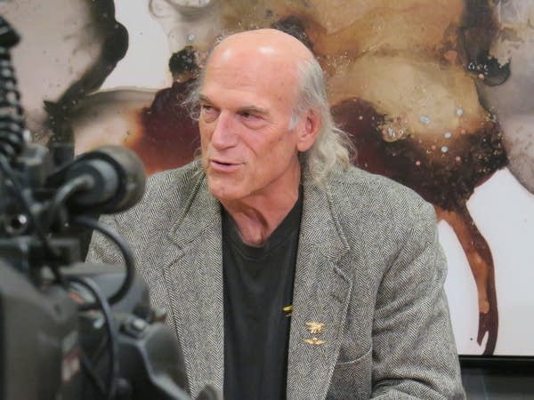 Former Minnesota Gov. Jesse Ventura speaks to reporters.