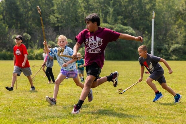 children playing stickball