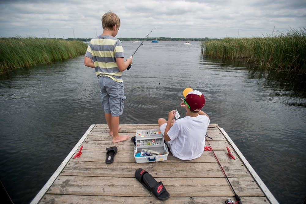 Dominick Schmit-DeRosa and Noah Engen fishing.