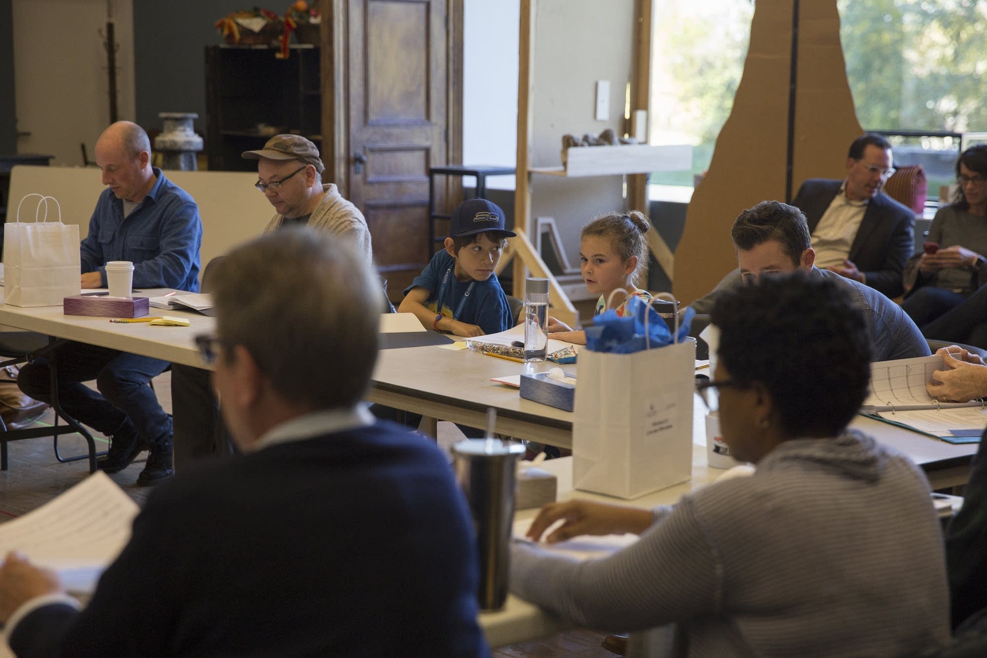 Sophie Jones chats with last year's Tiny Tim during a script reading.