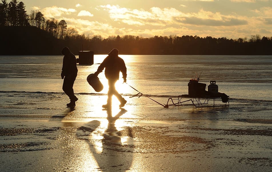 Wayne Juaire, left, and Blair Borg walk on Gull Lake