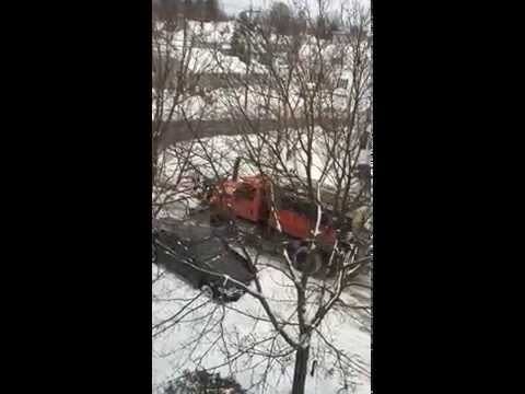 Plow driver takes frustration out on a car