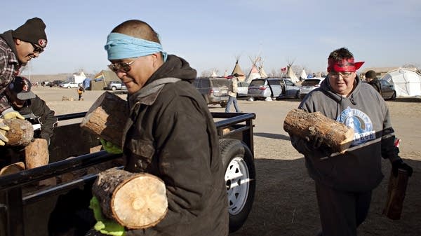 Red Lake members help prepare for winter.