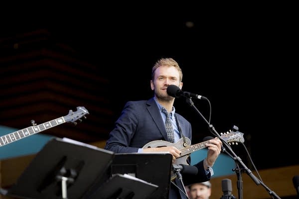 Poster Chris Thile takes in the crowd at the Telluride Bluegrass Festival.