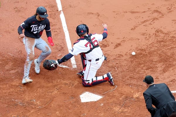 Austin Martin scoring at home base