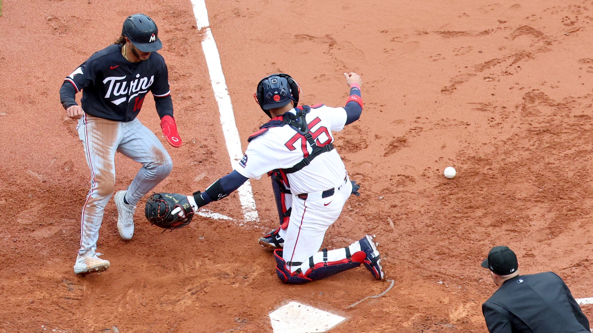 Twins complete three-game sweep over Red Sox with 6-5 win at soggy Fenway Park