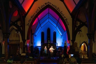 Two people inside church
