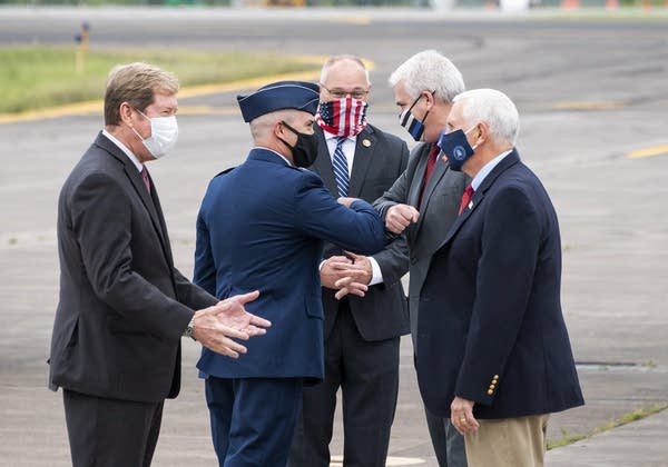 Vice President Mike Pence visits with Rep. Jason Lewis and Rep. Tom Emmer 