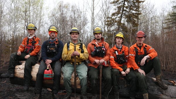 Firefighters work to battle the Stewart Trail wildfire.