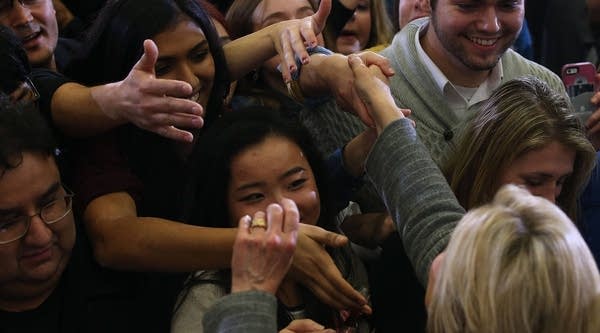  Democratic presidential candidate former Secretary of State Hillary Clinton shakes hands with supporters during a 'get out to caucus' event at Abraham Lincoln High School on January 31, 2016 in Des Moines, Iowa.