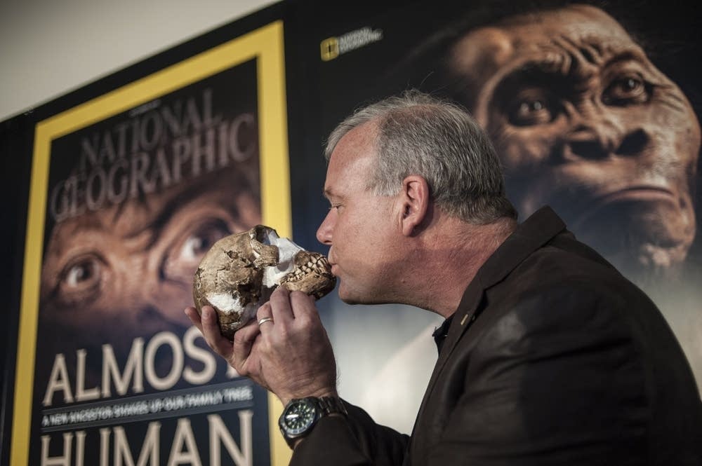 Prof. Lee Berger kisses Homo naledi skull