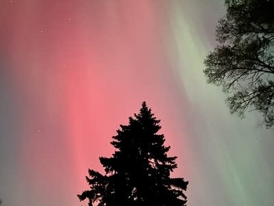 Reds and greens in the night sky.