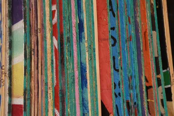 plywood art stacked on end