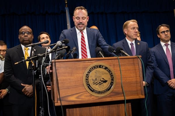 A man speaks at a press conference