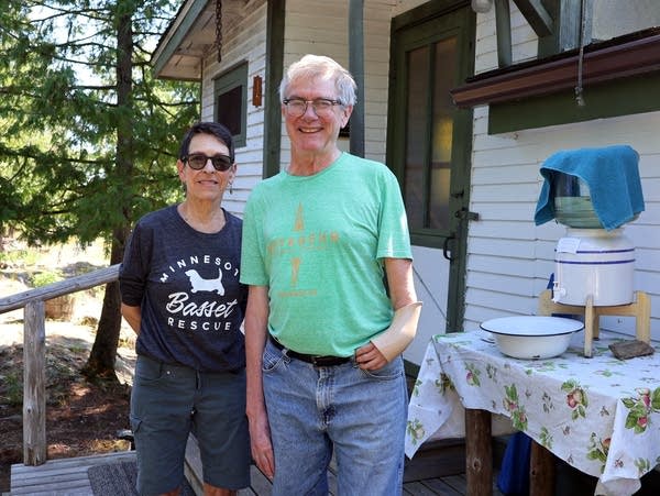 A man and a woman pose for a photo