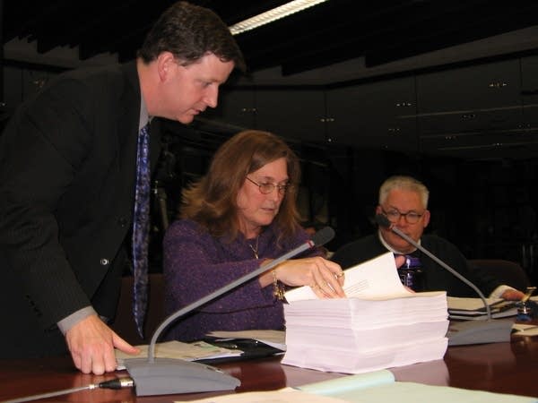 Elections officials go through results