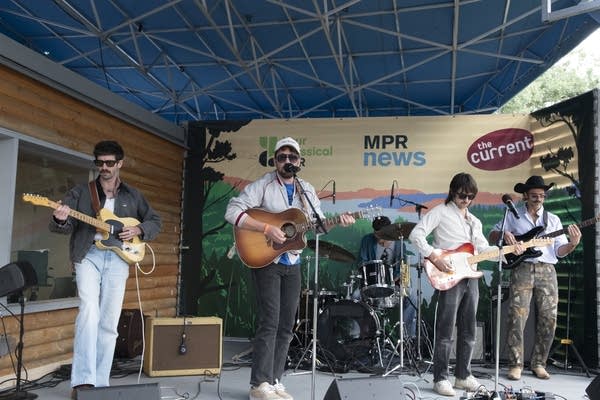 Jason Scott and the High Heat perform at the MPR booth at the Minnesota State Fair