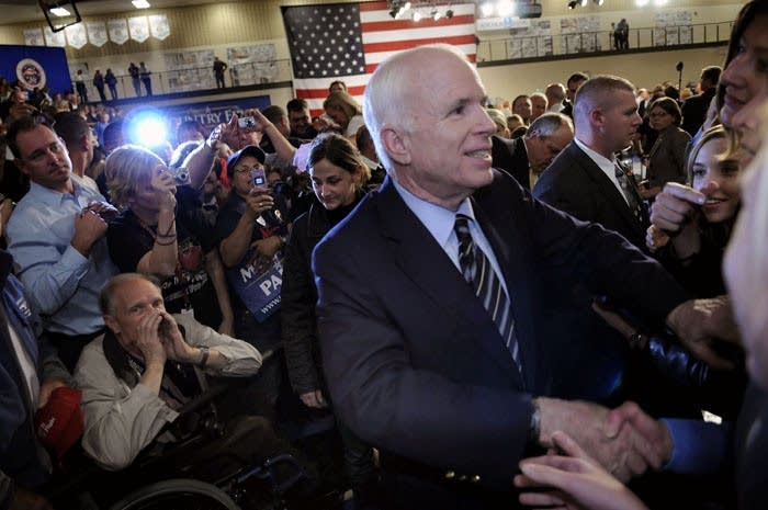McCain shakes hands with supporters