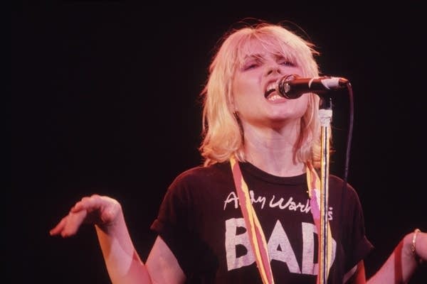 1980: Debbie Harry, American model and lead singer of the new wave band, Blondie, on stage.