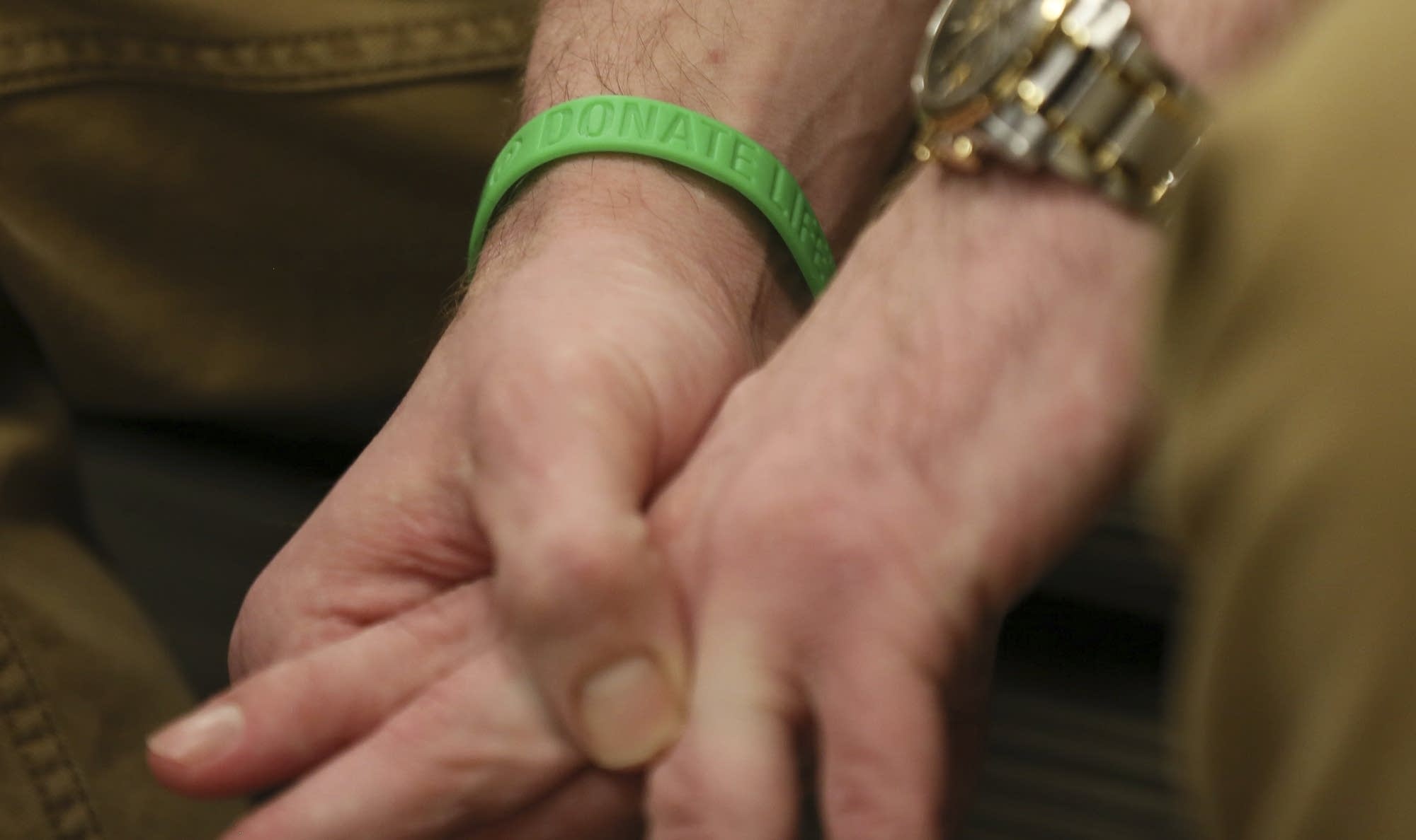 Andy Sandness wears a LifeSource bracelet