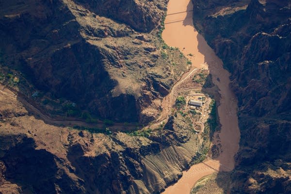 Rescuers saved some 80 people in Grand Canyon floods that left 2 dead and 1 missing, officials say