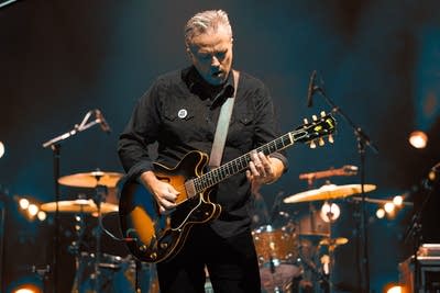 Jason Isbell and the 400 unit performing on stage