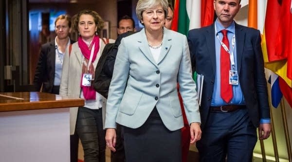 Britain Prime minister Theresa May leaves after the Eastern Partnership summit at the European Council headquarters in Brussels on Nov. 24, 2017.