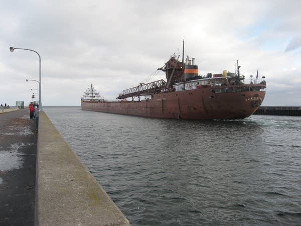 A ship approaches the bridge