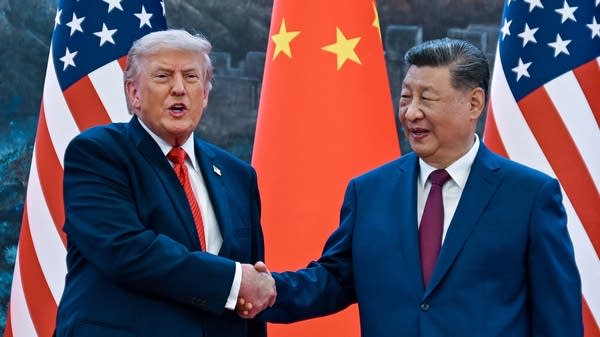 President Donald Trump shakes hands with President Xi Jinping at the Great Hall of the People in Beijing on May 14, 2026.