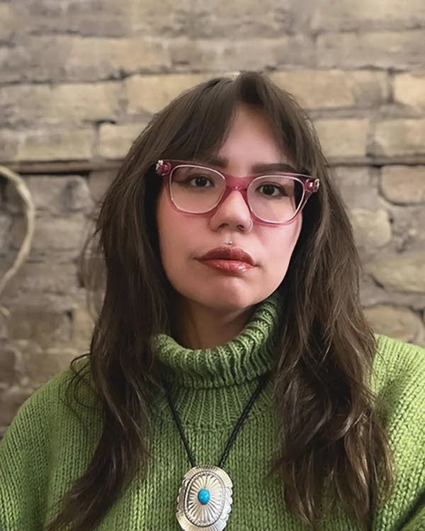 A person in a green sweater