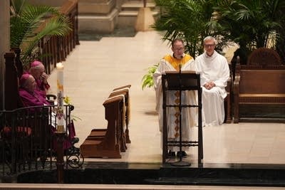 A priest reads 