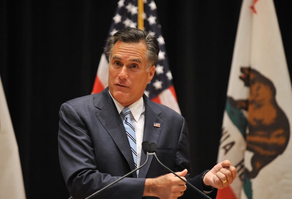 Romney speaks with reporters