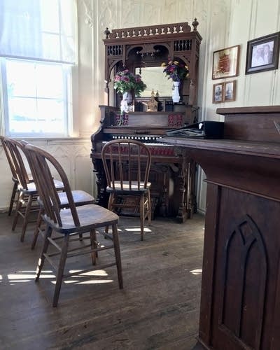 A view inside a small one-room church.