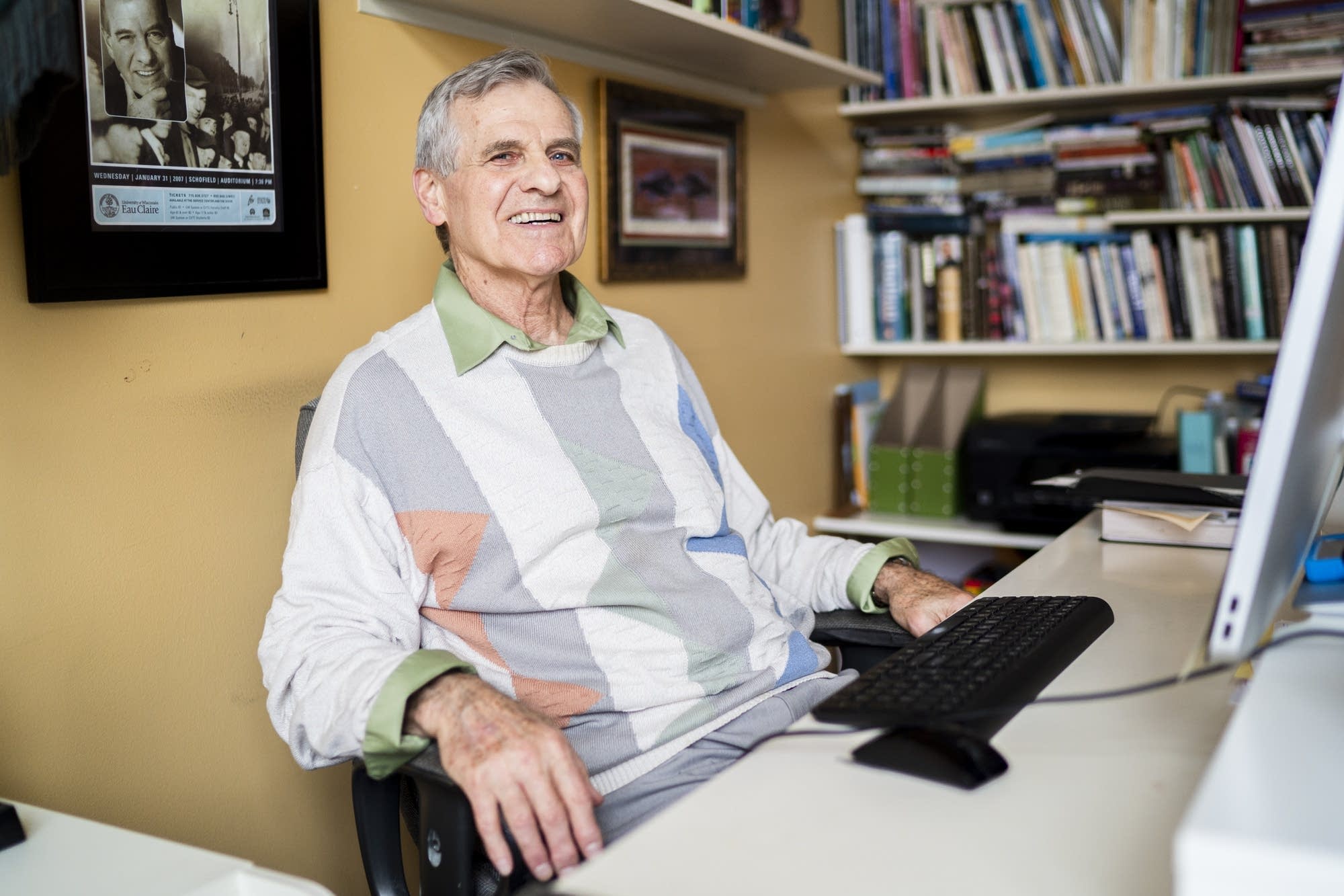 Author Michael Fedo sits for a portrait inside his Coon Rapids, Minn. home.