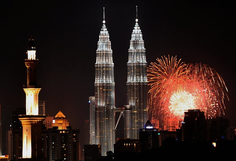 Fireworks light up the sky near the Malaysia