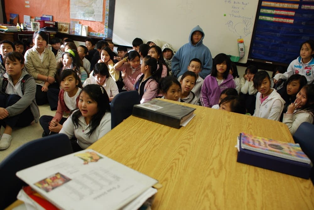 Students practice a song forthe Hmong New Year