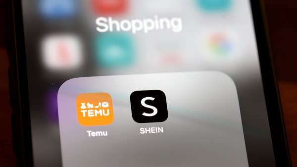 The apps for Shein and Temu are displayed on a phone. While Trump's sweeping tariffs may be gone, many are still in place, including on cheaper items sold through those websites.