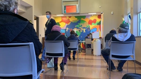 Patients at a low-income clinic in Nashville wait to be seen. During the pandemic, Medicaid programs were not allowed to drop patients, but income reviews will restart once the public health emergency ends. 