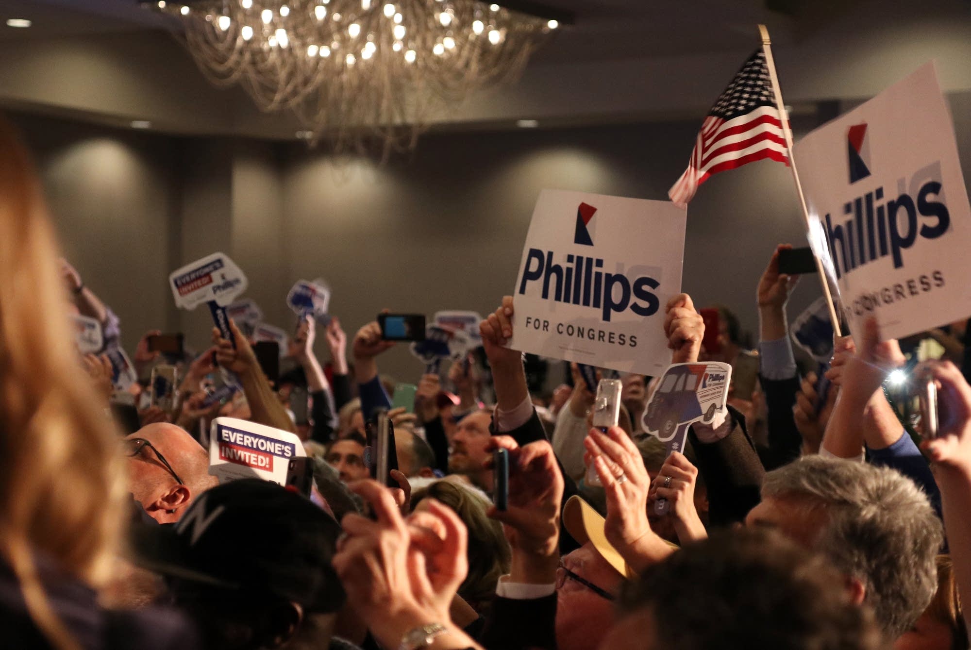 Supporters celebrate as Dean Phillips speaks.