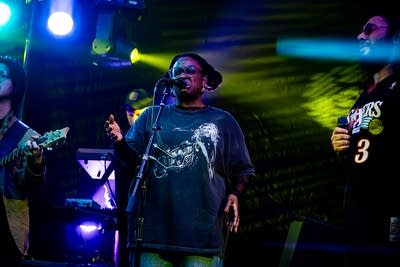 A musician sings onstage