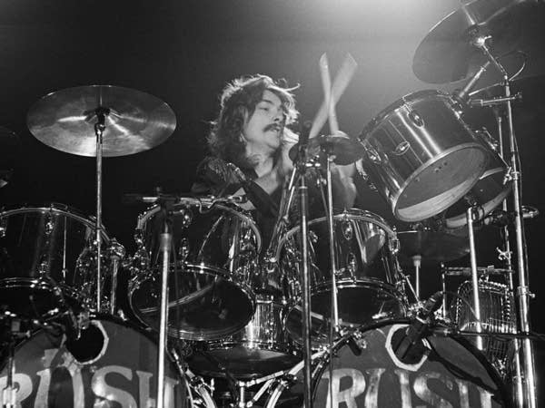 Drummer Neil Peart performing onstage with Rush in Springfield, Mass., in 1976.