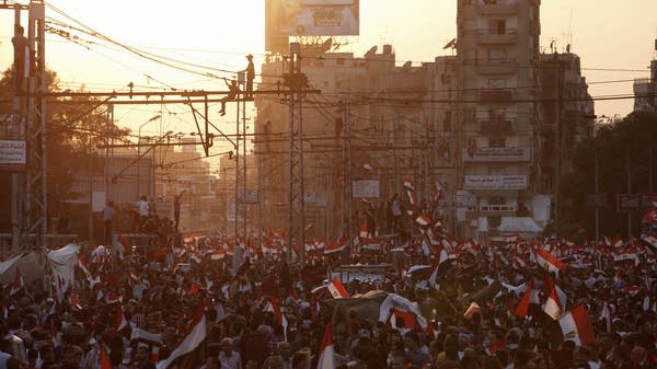 Protesters demonstrate at the Egyptian Presidential Palace on July 2, 2013, in Cairo.