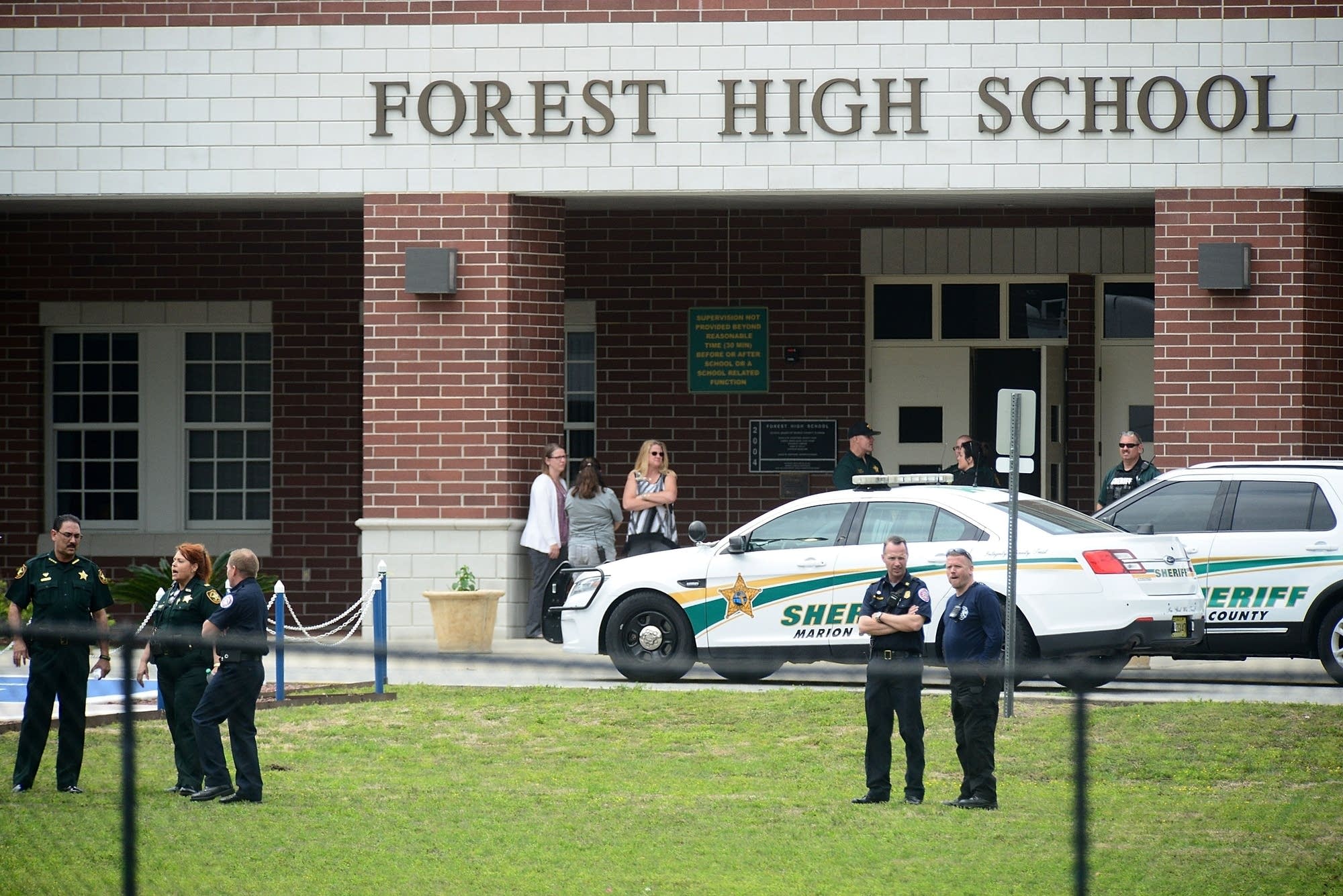 One person injured in shooting at high school, suspect in custody One person injured in shooting at high school, suspect in custody