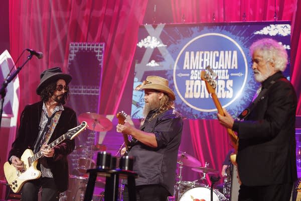 A band performing onstage
