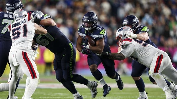 The Seattle Seahawks playing against the New England Patriots during Super Bowl LX. 
