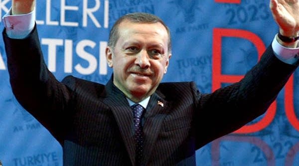 Turkey's Prime Minister Recep Tayyip Erdogan gestures during a meeting of his ruling party, the Justice and Development Party (AKP), to present the candidates for the June 12 general elections in Ankara on April 18, 2011.