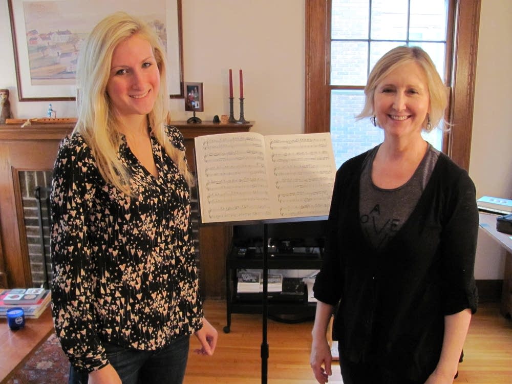 Flutist Wendy Williams, right, with a student