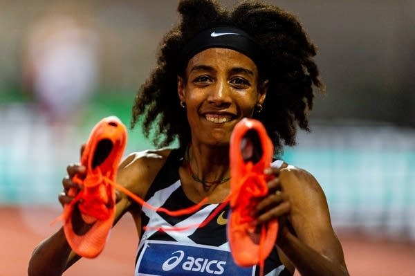 Sifan Hassan of Netherlands celebrates after winning in Women's 1500 Metres during the Golden Gala Pietro Mennea Diamond League event on June 10, 2021 in Florence, Italy. (Photo by Marco M. Mantovani/Getty Images)