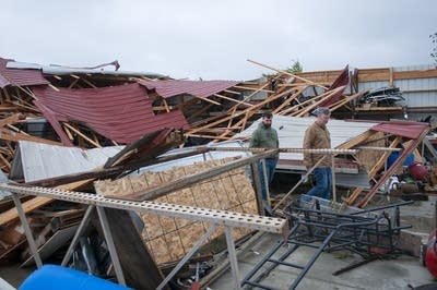 Damage from a storm is seen throughout a town.