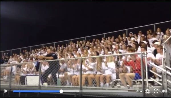 At football game, Wisconsin cop drives the bus